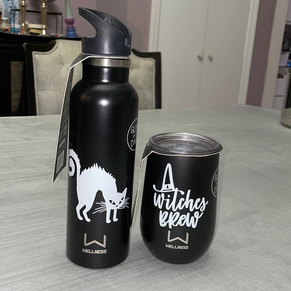 Two double wall stainless steel glow in the dark festive drink ware
